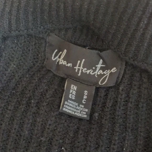 Black Off-the-Shoulder Sweater with Unique Cut-Out Neckline and Fitted Sleeves - Picture 8 of 9